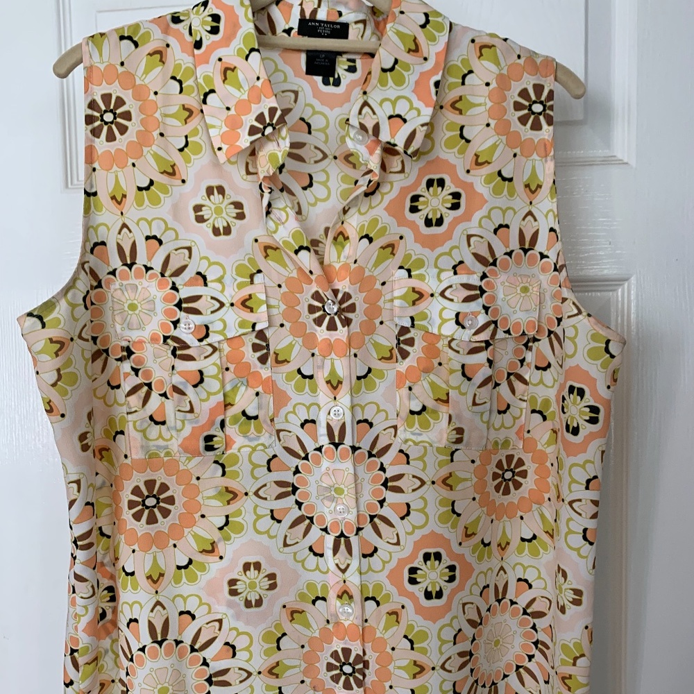 Sleeveless button up blouse